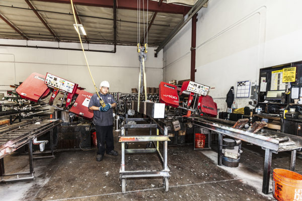 Metal Bars-Man working on metal cutting machine Linda Joseph-Turek_Silver Moon Photography-0390